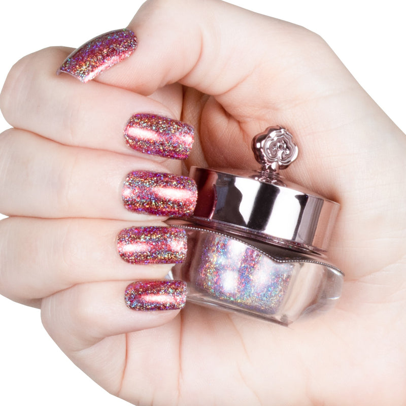Nails showing shade of pink with holographic shine