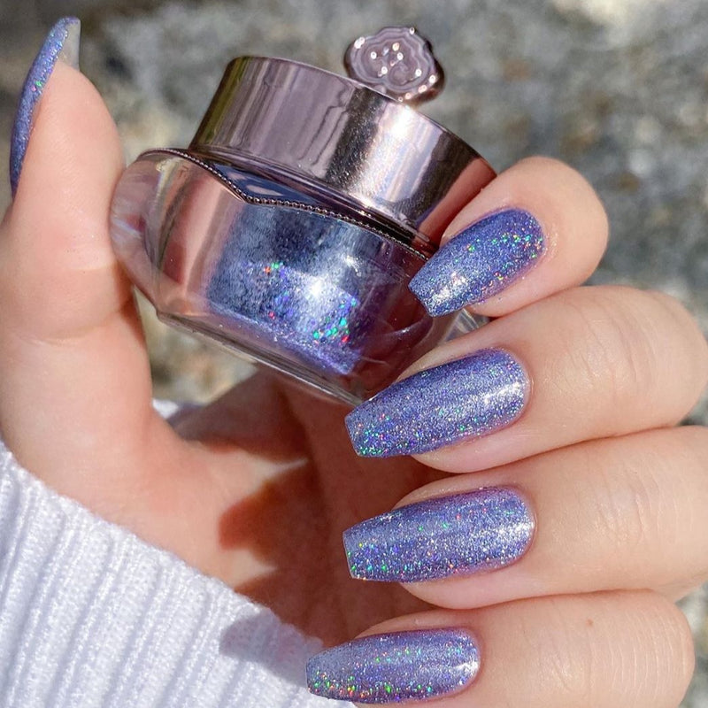 Nails showing soft purple with holographic tone