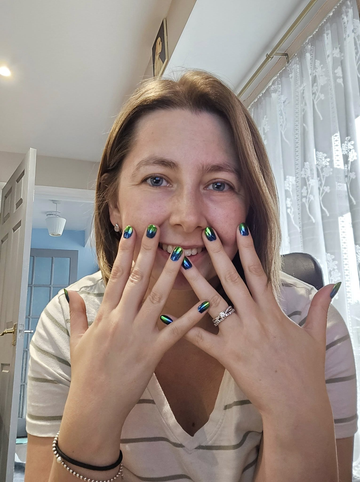 A Sistaco Collective member sharing her manicure
