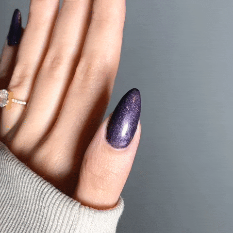 Nails showing deep rich classic purple shade