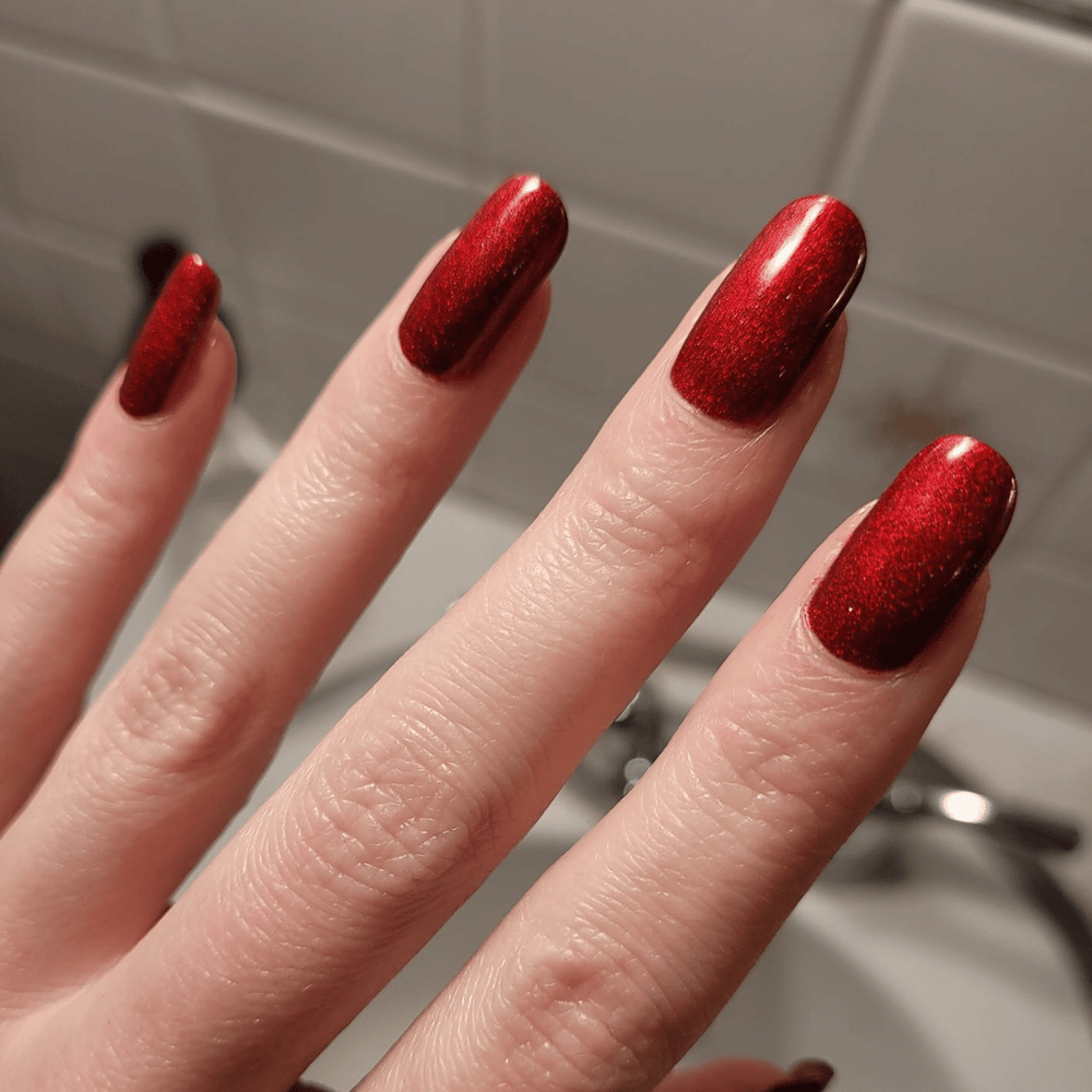 Metallic Ruby Nails That Shine Bright