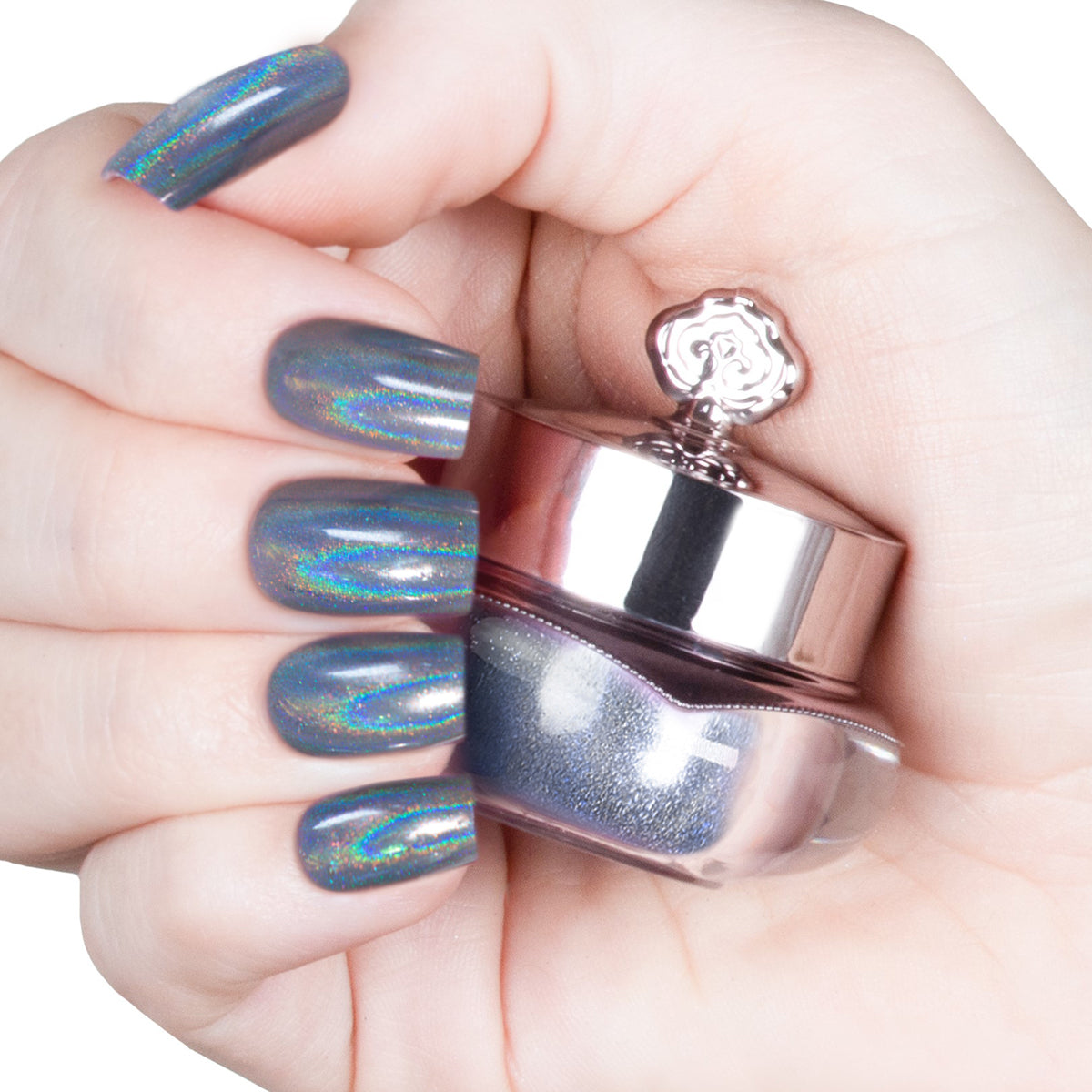 Nails featuring a nude-silver holographic powder with a soft, airy shimmer and prismatic effect.
