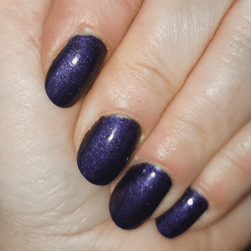 Nails showing deep rich classic purple shade