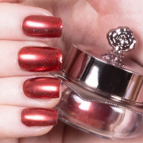 Nails showing dark rich shade with metallic effect