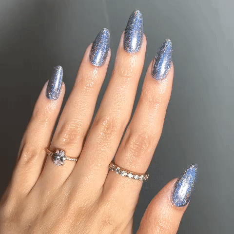 Nails showing soft purple with holographic tone