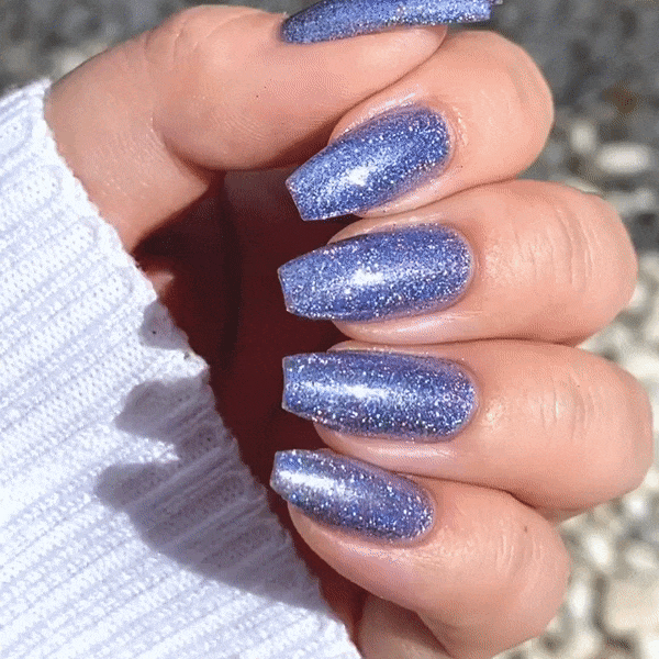 Nails showing soft purple with holographic tone