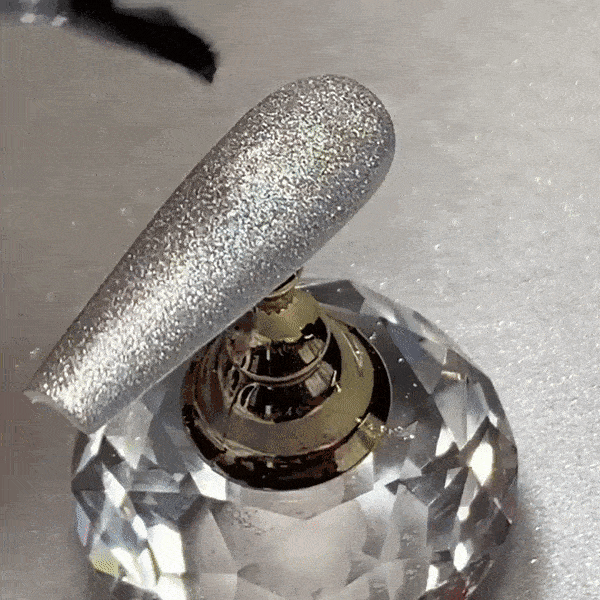 Nails showing Silver shade with holographic shine